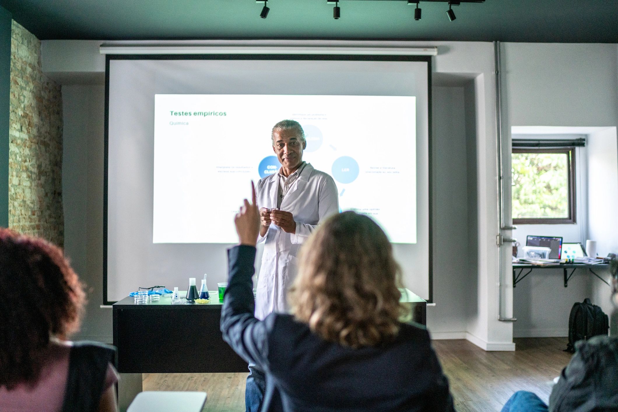 Instructor presenting to a group during a training session